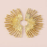 Pendientes de metal con borde ondulado