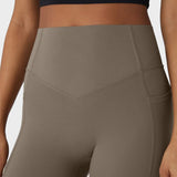 Mallas de entrenamiento con control abdominal, elevación de glúteos y bolsillos