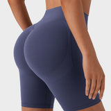 Pantalones cortos deportivos moldeadores de 7" – Con control abdominal, efecto lifting y bolsillos prácticos