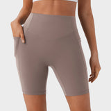 Pantalones cortos deportivos moldeadores de 7" – Con control abdominal, efecto lifting y bolsillos prácticos