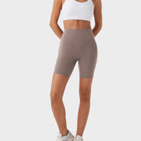 Pantalones cortos deportivos moldeadores de 7" – Con control abdominal, efecto lifting y bolsillos prácticos
